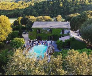 an aerial view of a house with a swimming pool at Chambres de charme - 2 chambres indépendantes avec salles de bains privatives in Corte