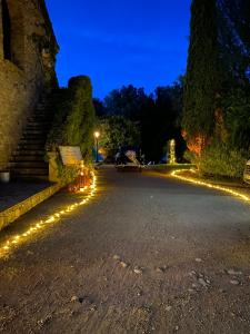 an empty street with lights on it at night at Chambres de charme - 2 chambres indépendantes avec salles de bains privatives in Corte +4 photos