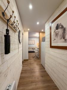 a hallway of a home with a wall at Les Volets Bleus in Chartres