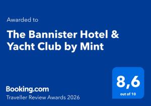 a blue sign that reads the barrister hotel yacht club by mint at The Bannister Hotel & Yacht Club in Santa Bárbara de Samaná +36 photos