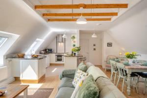 a living room with a couch and a table at 2 Bed in Shipham oc-s31934 in Shipham