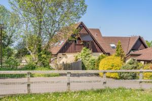 a house with a fence in front of it at 2 Bed in Shipham oc-s31934 in Shipham