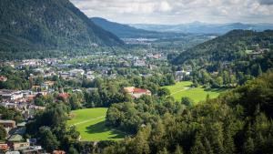 an aerial view of a village in the mountains at Refugium.311 in Bad Reichenhall