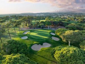 an aerial view of a golf course with trees at Vilamoura Condo facing the pool by Algarve Dream Holidays in Quarteira