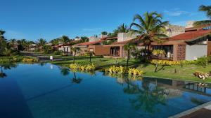 a villa with a swimming pool in a resort at Alma Maraú - Praia do Cassange in Marau +20 photos