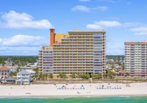 a view of a hotel from the beach at Gulf-Front Paradise, Steps to Beach & Pool Access in Panama City Beach