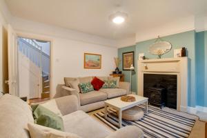 a living room with a couch and a fireplace at 2 Bed in Cromer oc-t29986 in Cromer