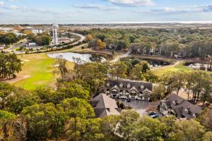 an aerial view of a house and a golf course at SB25A Clubhouse Villa 2BR in Sunset Beach