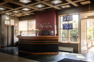 a bar in the lobby of a restaurant at Patagonia Sur Hotel in San Carlos de Bariloche