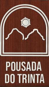 a sign that says pucada do trinidad at Pousada do Trinta in Fernando de Noronha +100 photos