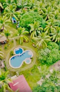 an aerial view of a resort with a swimming pool at Campo De Laiya in San Juan