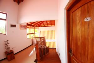 Postel nebo postele na pokoji v ubytování Grand Residence