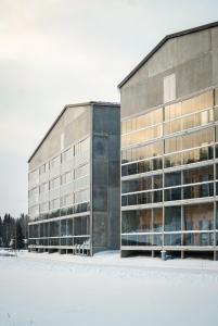 a large office building with a lot of windows at Break Sokos Hotel Himos in Jämsä