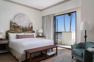 a bedroom with a bed and a large window at La Bahia Hotel & Spa in Santa Cruz +47 photos