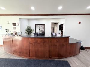 a wooden counter in a room with at Black Gold Suites Stanley in Stanley