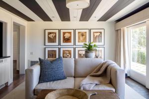 a living room with a couch and a table at Sttupa Estate Napa Valley in Napa