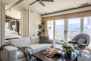 a living room with a couch and a table at Sttupa Estate Napa Valley in Napa