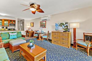 a living room with a couch and a table at Napili Shores E135 in Kapalua