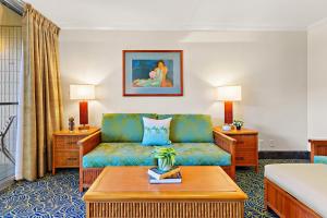 a hotel room with a couch and a bed at Napili Shores E135 in Kapalua +24 photos