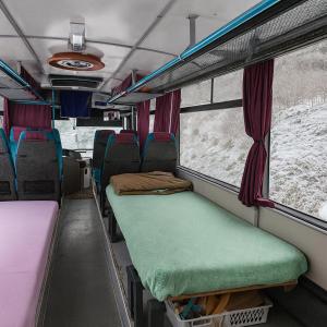 a bus with beds in the back of it at Bed in Bus in Kolárovice +17 photos