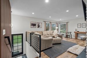 a living room with a couch and a table at The Covington Haus in Minnetonka