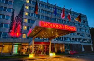 a hotel building with a sign that reads leonardo rover at Leonardo Royal Hotel Köln - Am Stadtwald in Cologne