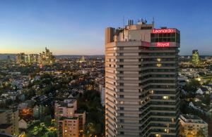 a view of a building with a toyota sign on it at Leonardo Royal Hotel Frankfurt in Frankfurt