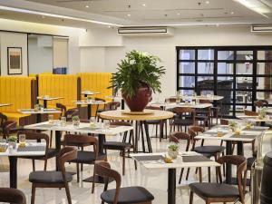 ห้องอาหารหรือที่รับประทานอาหารของ Hotel Benilde Maison De La Salle
