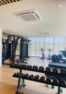 a gym with treadmills and exercise machines at Manzanillo Loft Morros EOS in Cartagena de Indias
