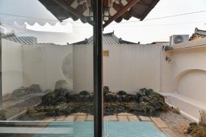 a view of a room with a view of a building at Stay Yeojin Yeomong in Gyeongju