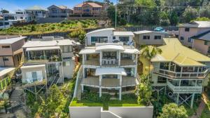 an aerial view of a house with houses at Shawhaven in East Ballina