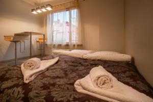Ένα ή περισσότερα κρεβάτια σε δωμάτιο στο Old Riga Galleria Apartment