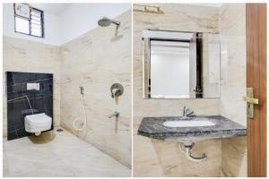 a bathroom with a sink and a toilet at Super Collection O Indore Near Omax City 1 in Kanāria