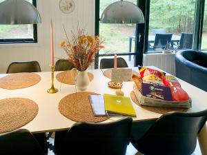 a table with some food on top of it at Summer House 300 M From Beach in Hals