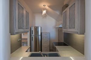 Kuchyň nebo kuchyňský kout v ubytování Aegean Queen Villas
