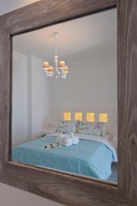 Postel nebo postele na pokoji v ubytování Aegean Queen Villas