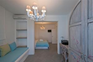 Postel nebo postele na pokoji v ubytování Aegean Queen Villas