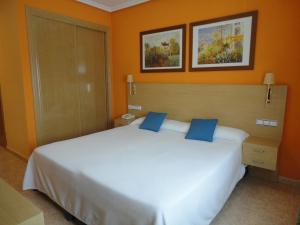 Postel nebo postele na pokoji v ubytování Hotel Mirador + 27 fotografií