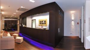 TV a/nebo společenská místnost v ubytování Medi Garden Hotel&Residence