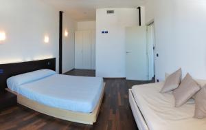 Postel nebo postele na pokoji v ubytování Medi Garden Hotel&Residence