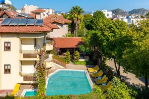 an aerial view of a house with a swimming pool at Üstün Apart in Marmaris