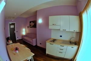 Kuchyň nebo kuchyňský kout v ubytování Medi Garden Hotel&Residence