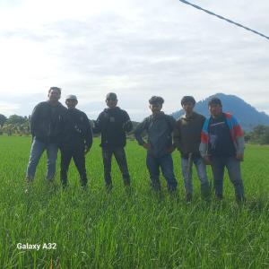 a group of men standing in a field at Kotabaru in Gununganjar +2 photos