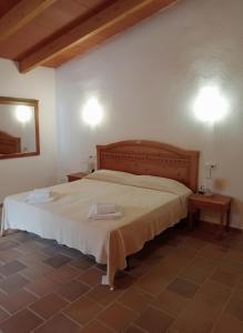 a bedroom with a large bed in a room at Cozy Chalet with Sea Views & Private Pool in Valldemossa +53 photos