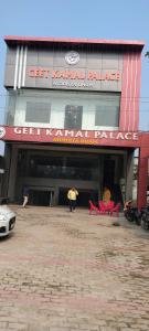 a building with people standing in front of it at GeetKamal Palace Ayodhya Dham in Ayodhya +7 photos