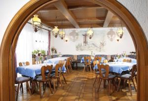 a large room with tables and chairs in it at Gasthof Siebenstern in Röslau