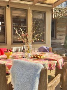 a table with a table cloth with fruit on it at Planetrees Estate in Beechworth +26 photos
