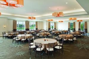a large banquet hall with tables and chairs at Hyatt Regency Wichita in Wichita