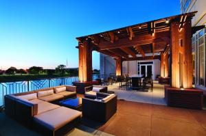 a patio with couches and tables on a building at Hyatt Regency Wichita in Wichita