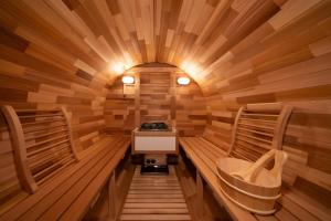 an inside view of a sauna with wooden walls at Doutonbori Crystal Exe in Osaka